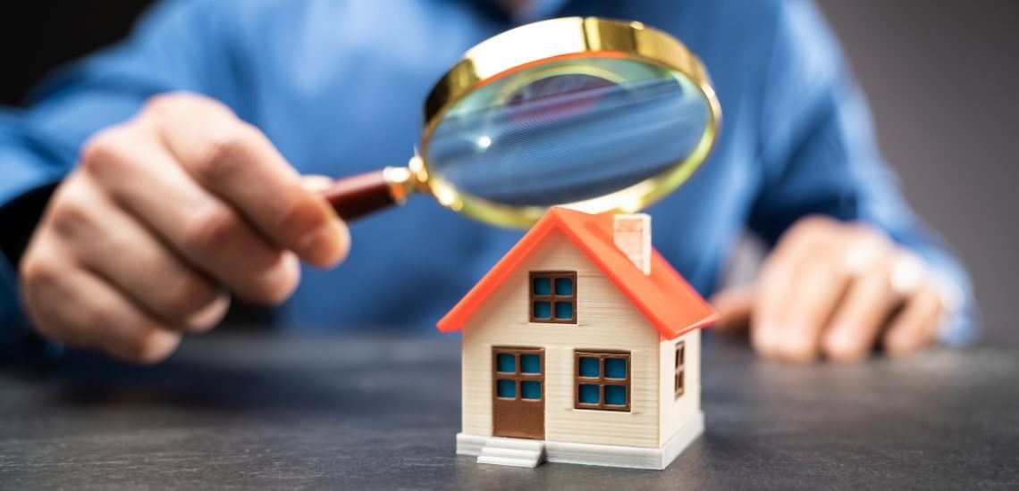 model-house-magnifying-glass